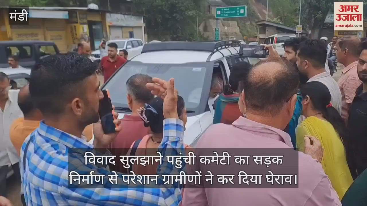 Villagers troubled by road construction gheraoed the committee that arrived to resolve the dispute