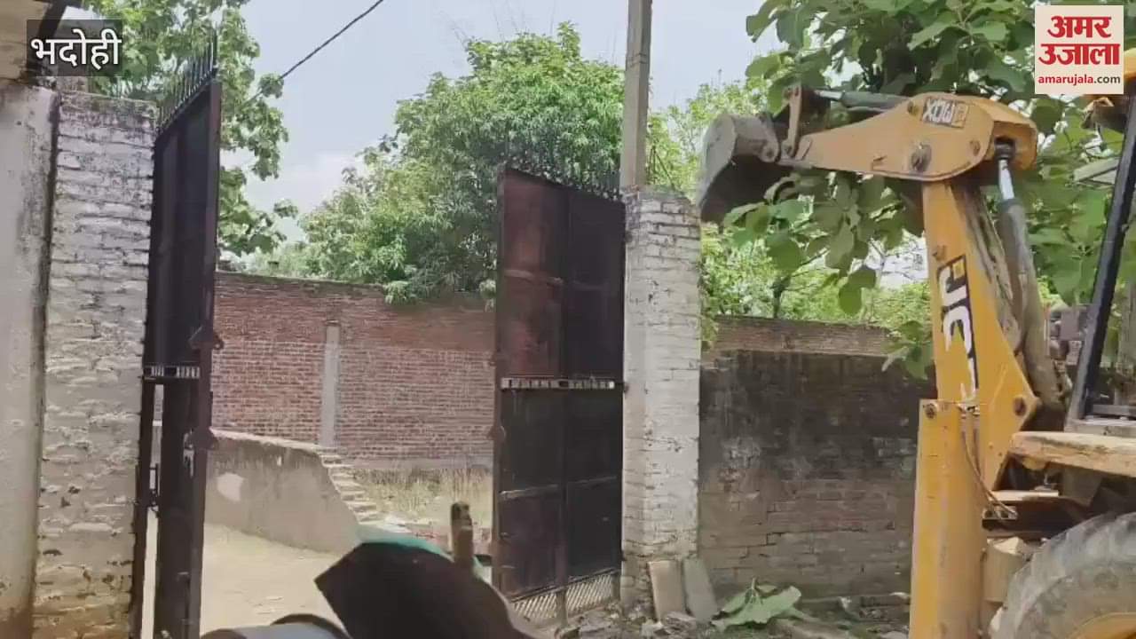 Revenue department demolished boundary wall built on drain with help of JCB commotion in village