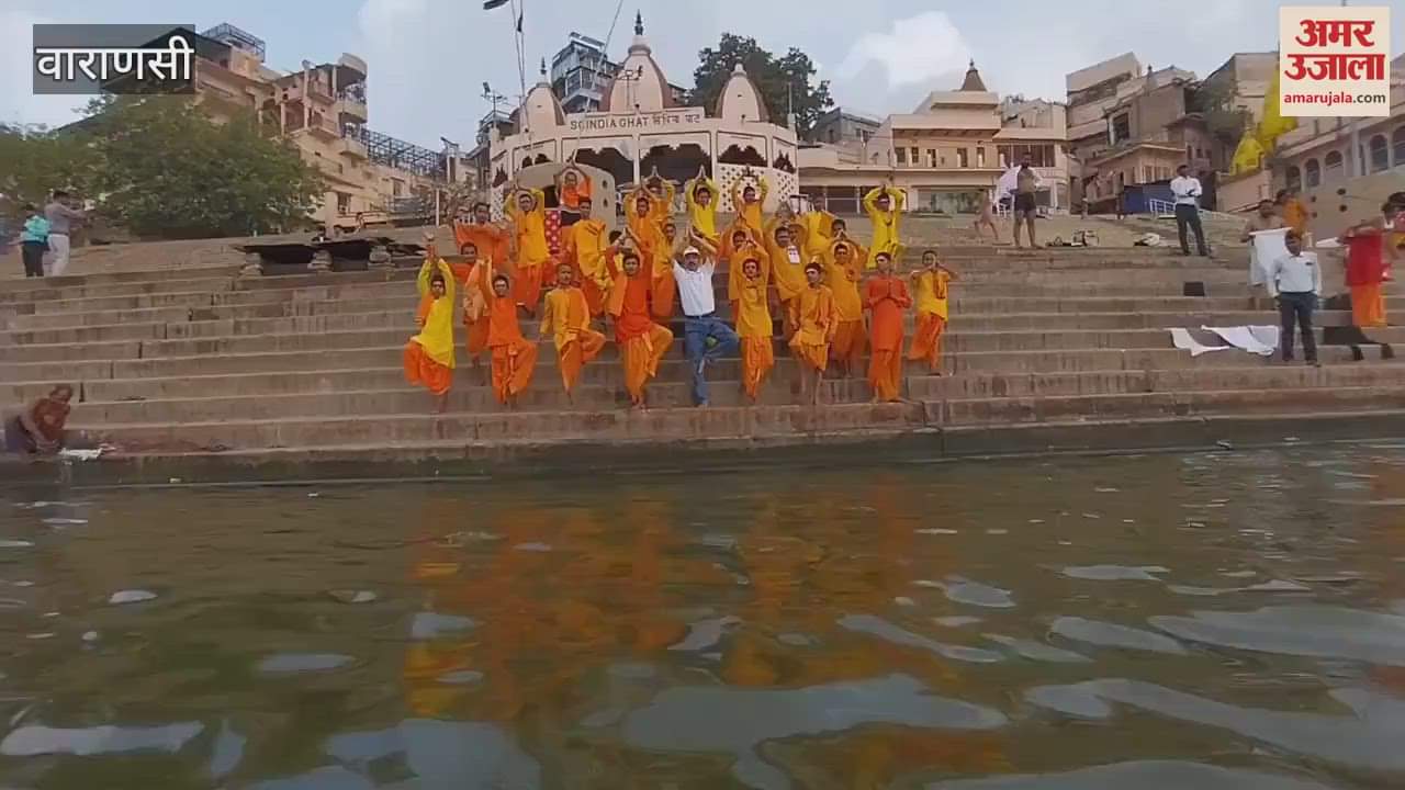 Took pledge to stay healthy by doing yoga on banks of Ganga students did yoga and pranayam