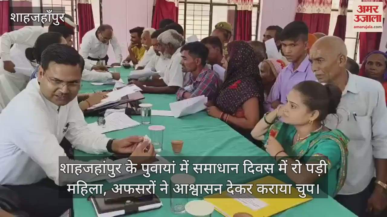 woman crying in front of officers in Shahjahanpur