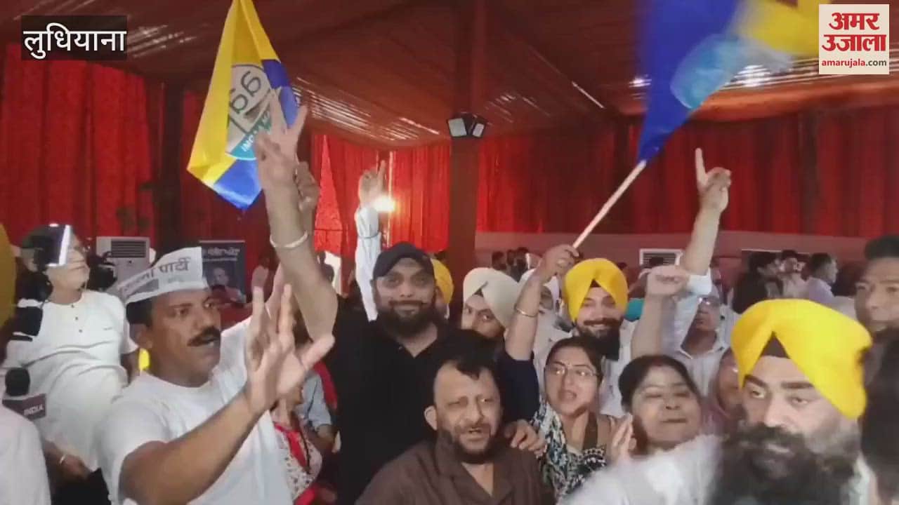 Workers celebrating at the office of AAP candidate Sanjeev Arora in Ludhiana