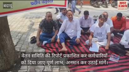 Employees sit on hunger strike in the district hospital premises of Badaun