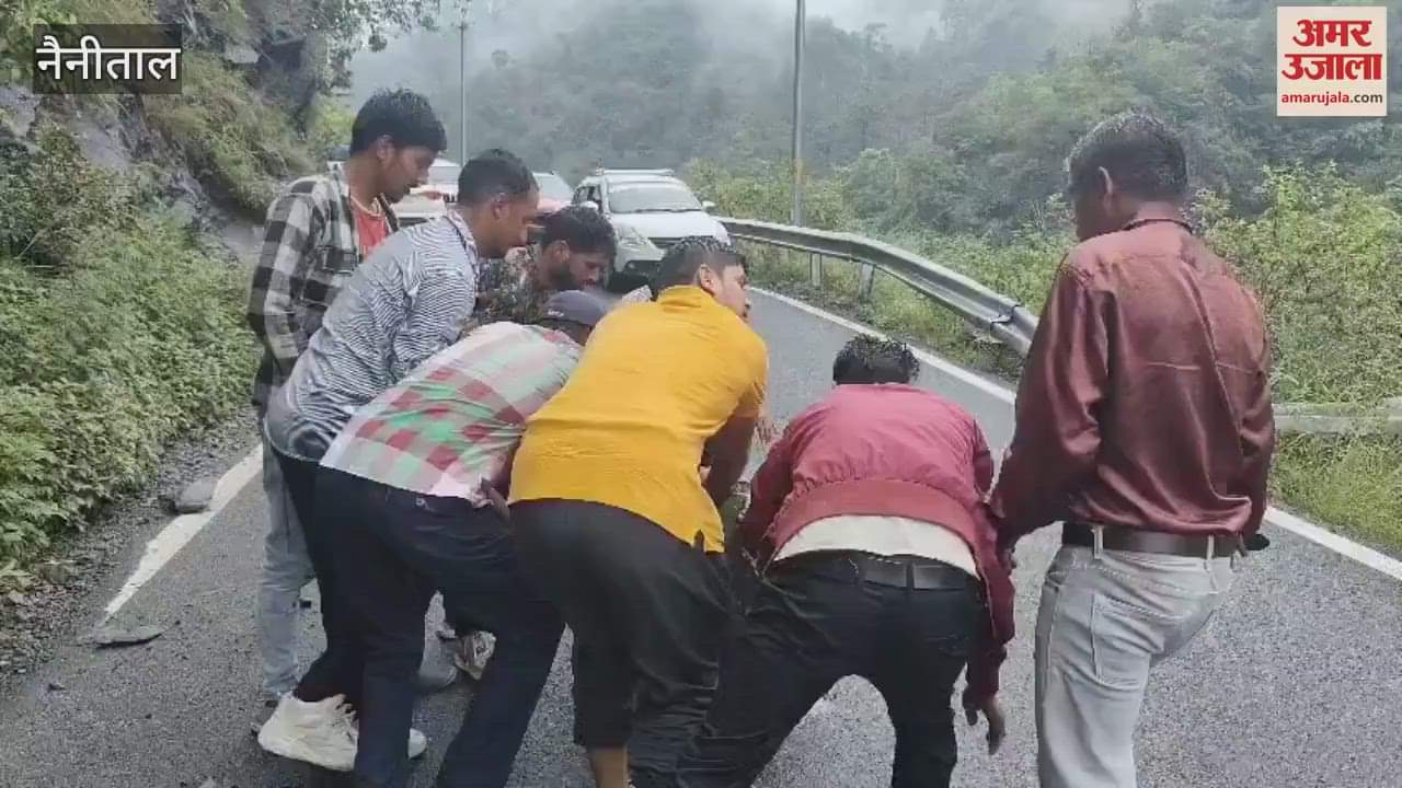 Passengers removed the boulder after it fell on the road in bhimtal