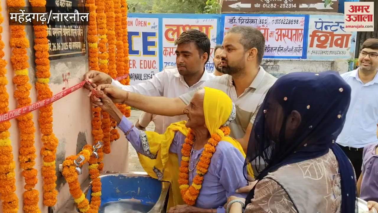 grandsons installed water cooler in village in memory of their grandfather In Narnaul