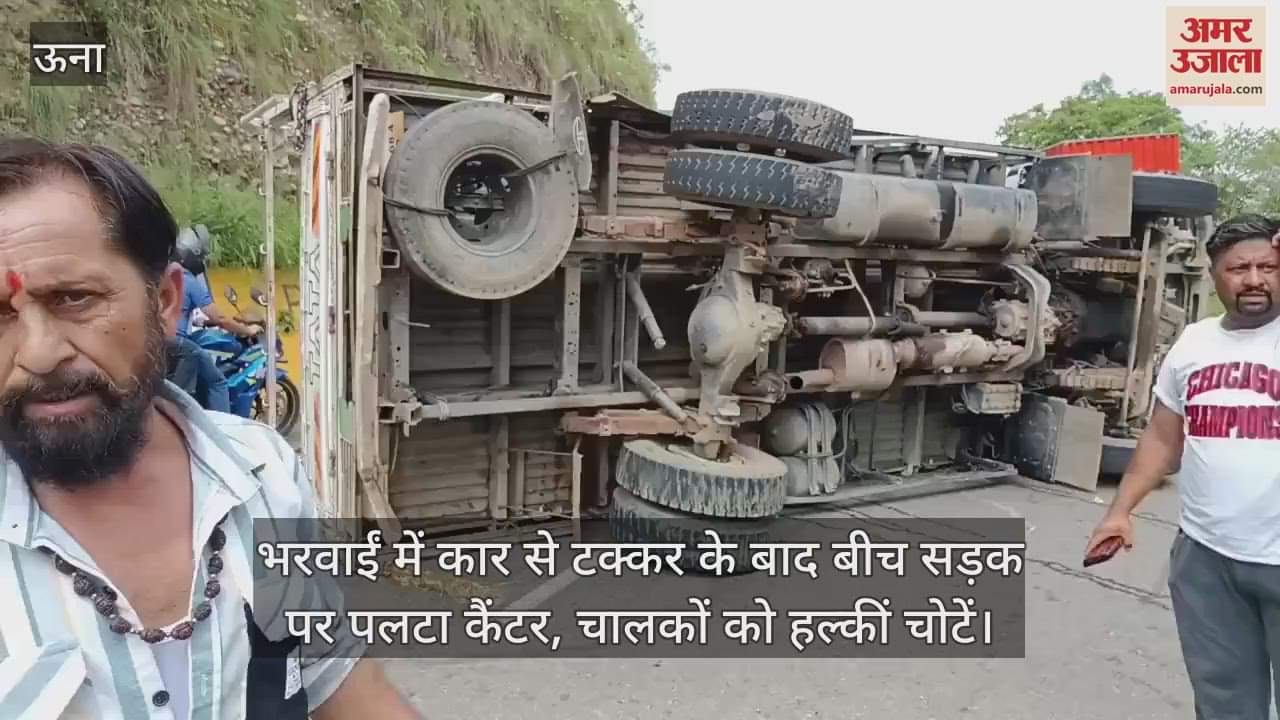 Canter overturned in the middle of the road after colliding with a car in Bharwain, drivers suffered minor injuries