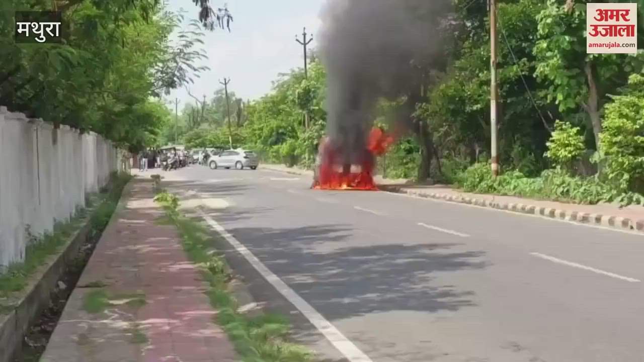 Fire breaks out in car on road
