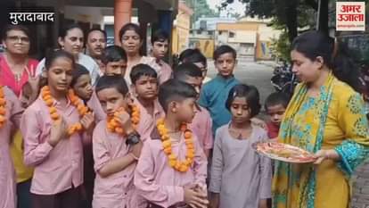 Children were welcomed with garlands in Moradabad Composite School
