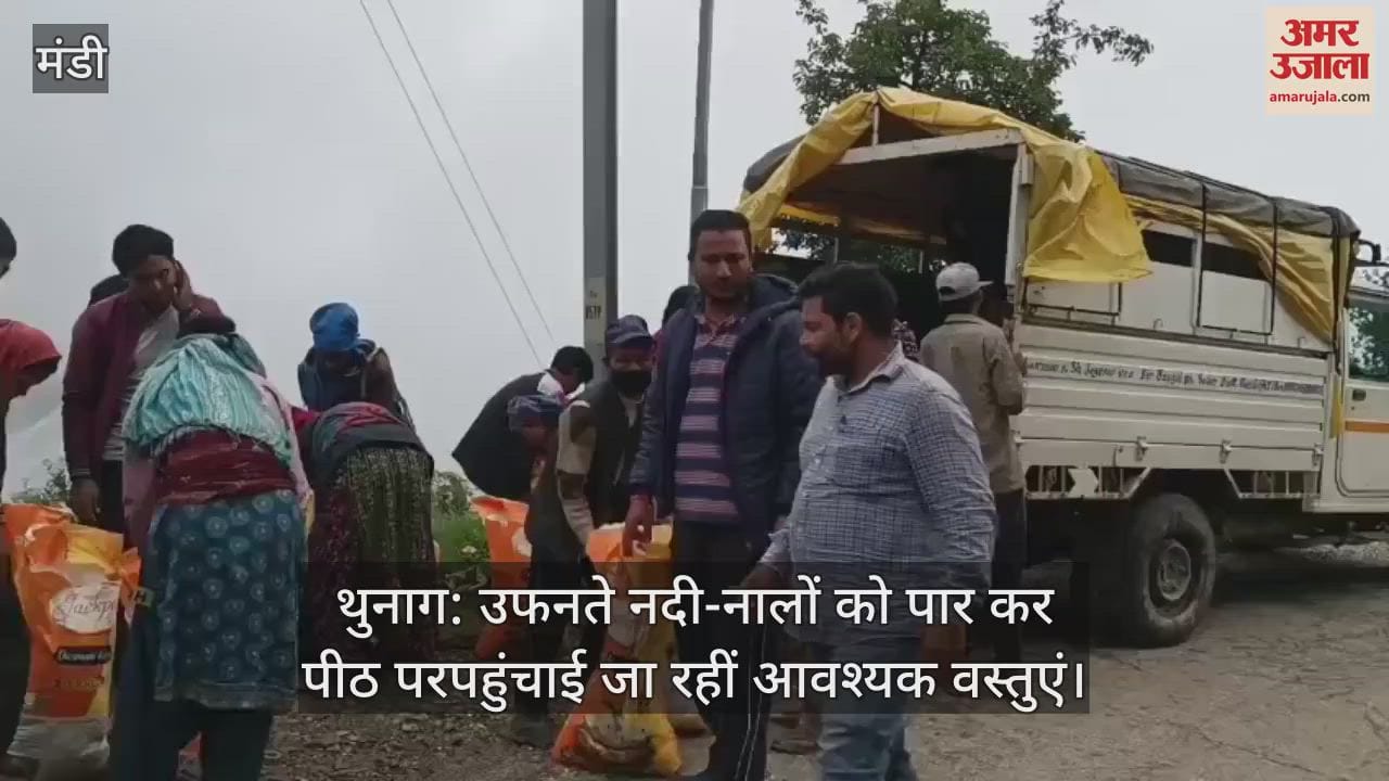 Thunag: Essential items are being carried on the back crossing the overflowing rivers and streams