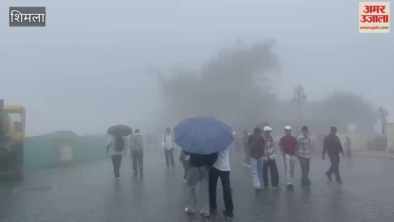 Shimla is covered with clouds fog and light rain showers