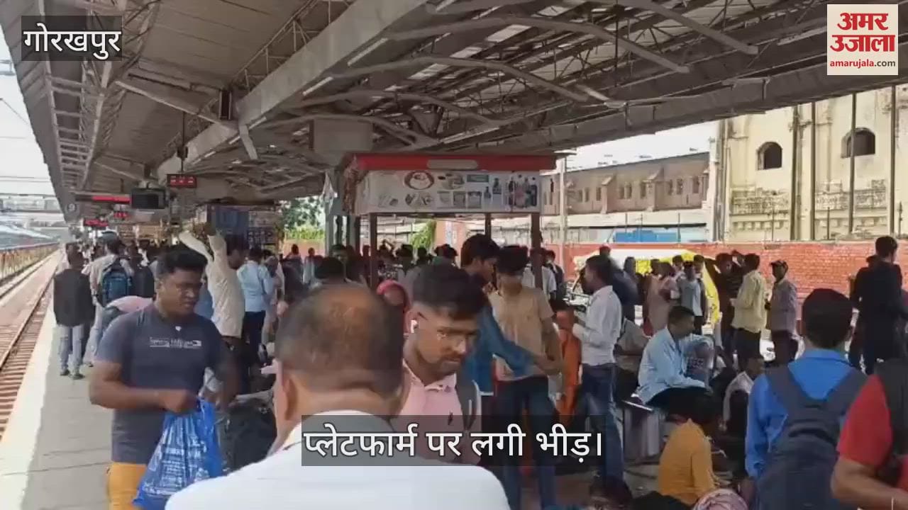 Crowd gathered on the platform waiting for Purvanchal Express train