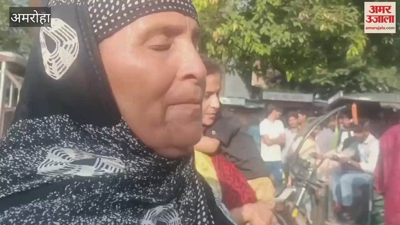 woman lay down on the road in front of the police station after a dispute with her in-laws, causing a commotion.