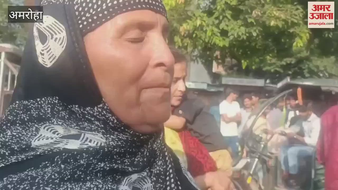 woman lay down on the road in front of the police station after a dispute with her in-laws, causing a commotion.