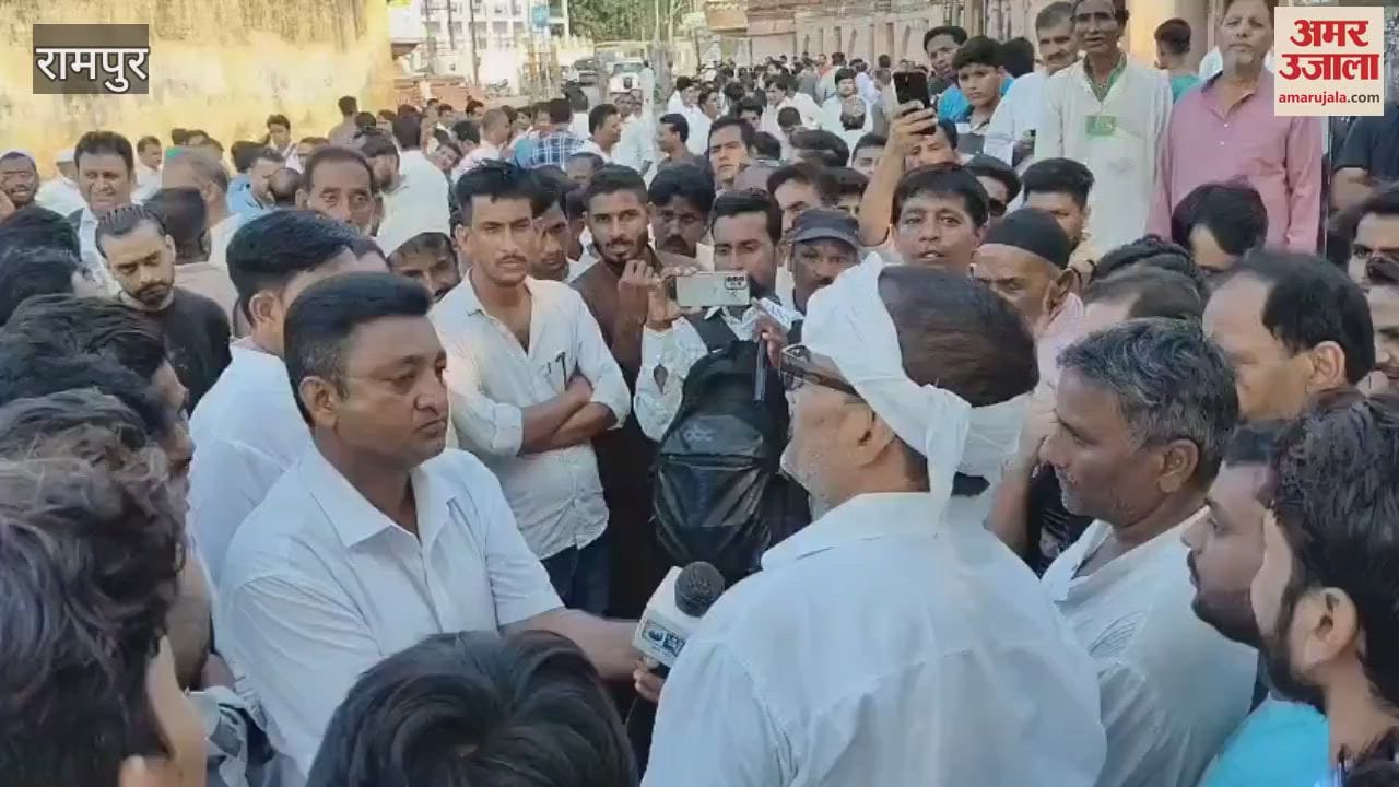 large crowd of supporters gathered at Azam Khan's residence, with high spirits among the party workers.
