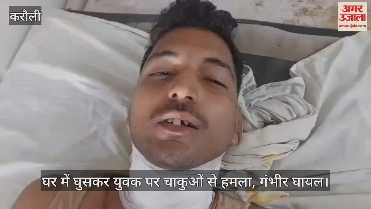 A young man was attacked with knives after entering his house, seriously injured.