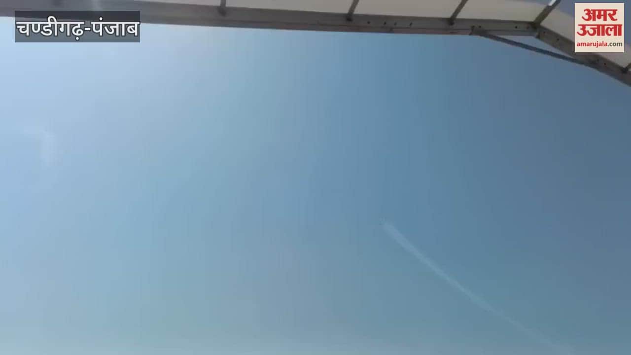 Surya Kiran Aerobatic Team performs at the farewell ceremony of MiG 21