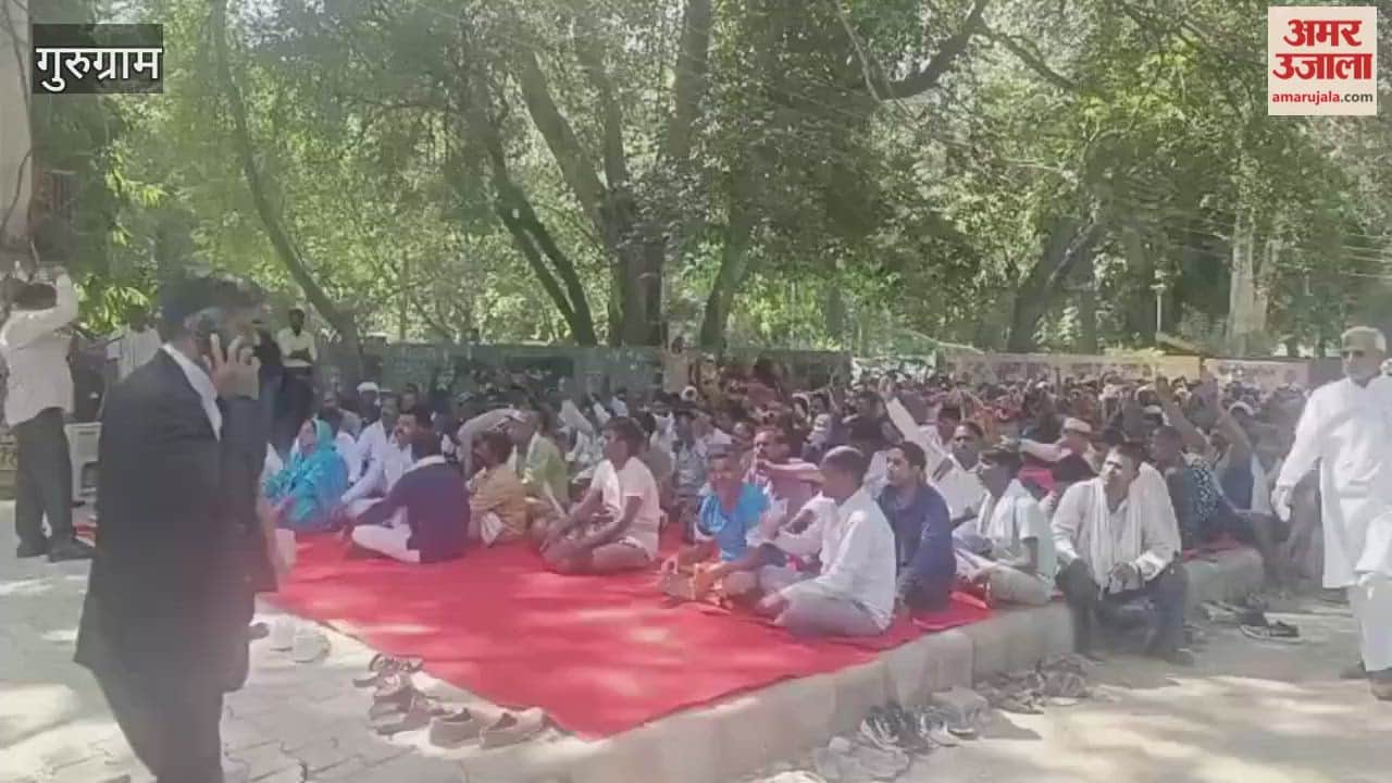 Employees protest in front of the Deputy Commissioner's office in Gurugram