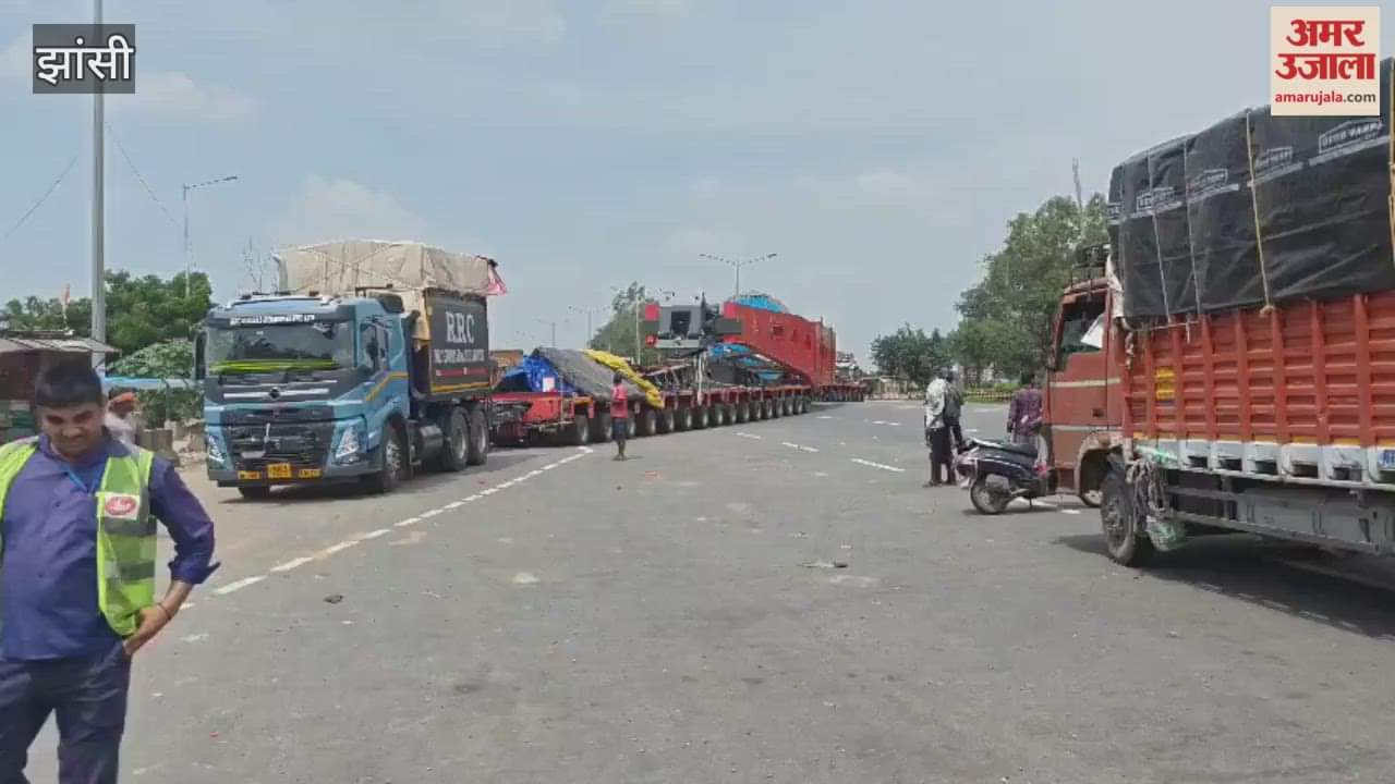 Video: You'll be dizzy counting the wheels of this truck...two drivers operate it simultaneously.