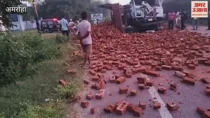 truck collided with a tractor-trailer loaded with bricks, crushing two workers; both died in the accident in Sambhal