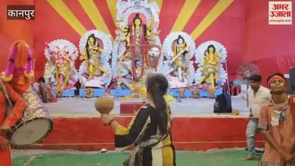 Durga Puja celebrations in Kanpur, with young women performing the Dhunuchi dance