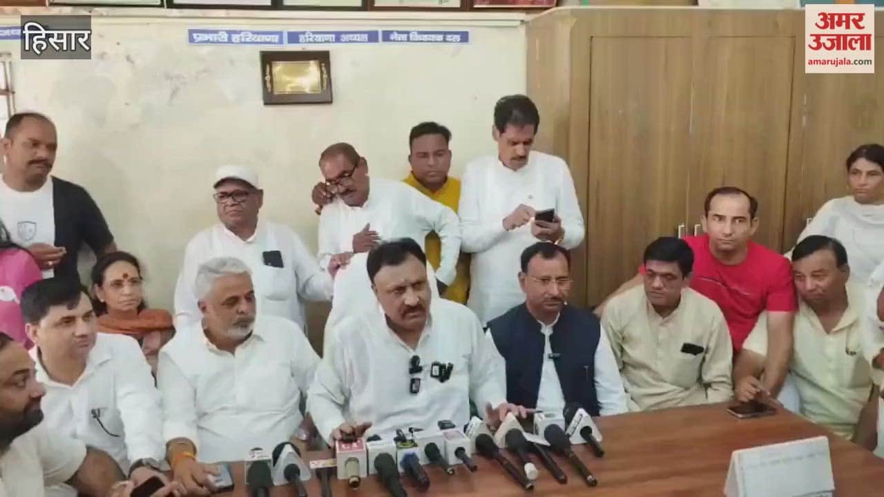 In Hisar, Congress party workers celebrated by distributing sweets and playing drums at the party office.