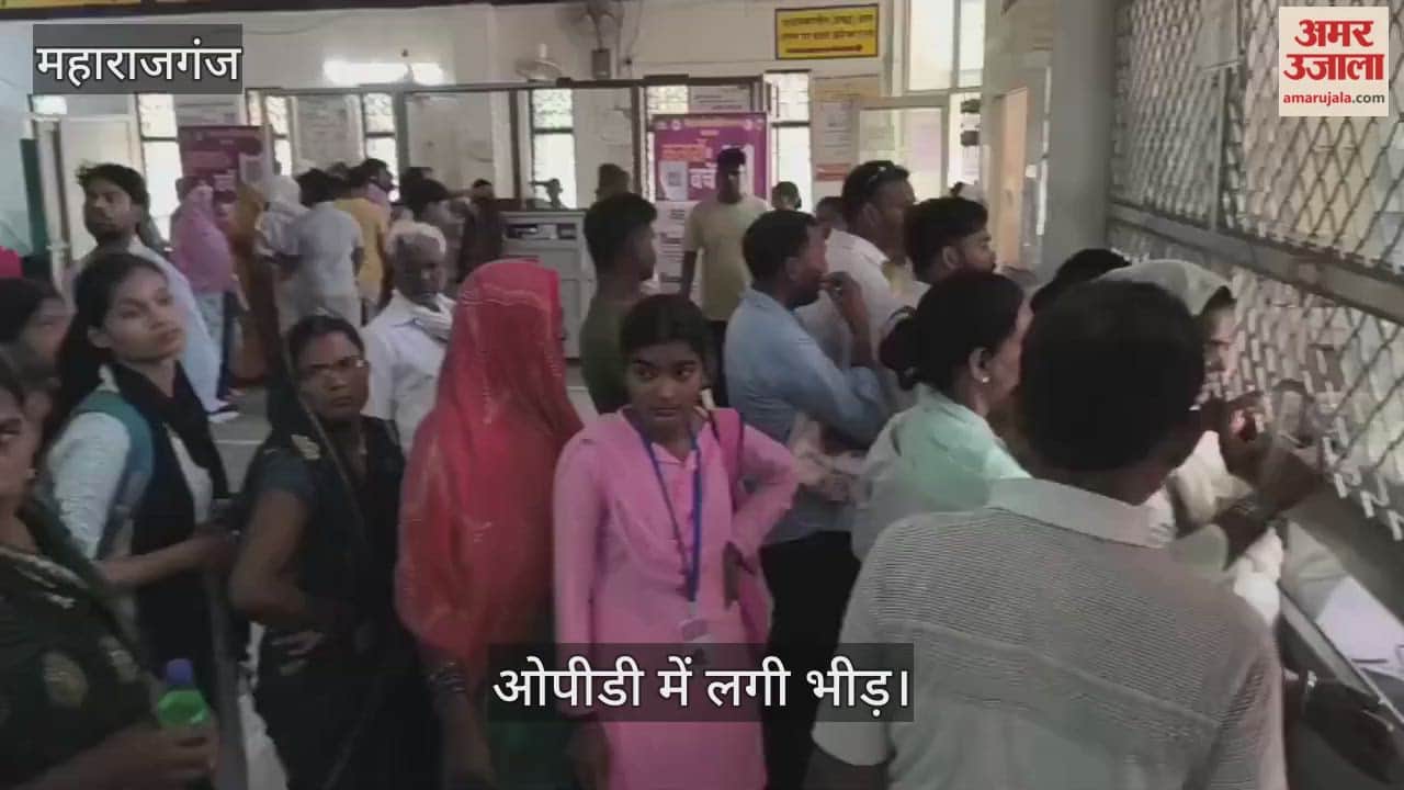 Crowd of patients in the district hospital, people are falling ill due to fever.