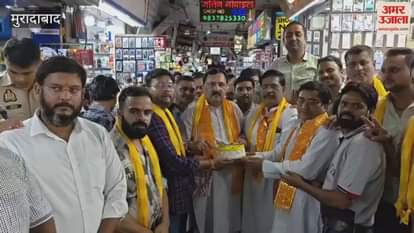 Supermarket owners expressed their joy at the GST reduction and celebrated by cutting a cake