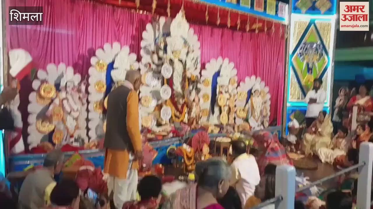 Shimla Sandhi Puja was performed with chanting of mantras beating of drums and Jokara of Bengali women
