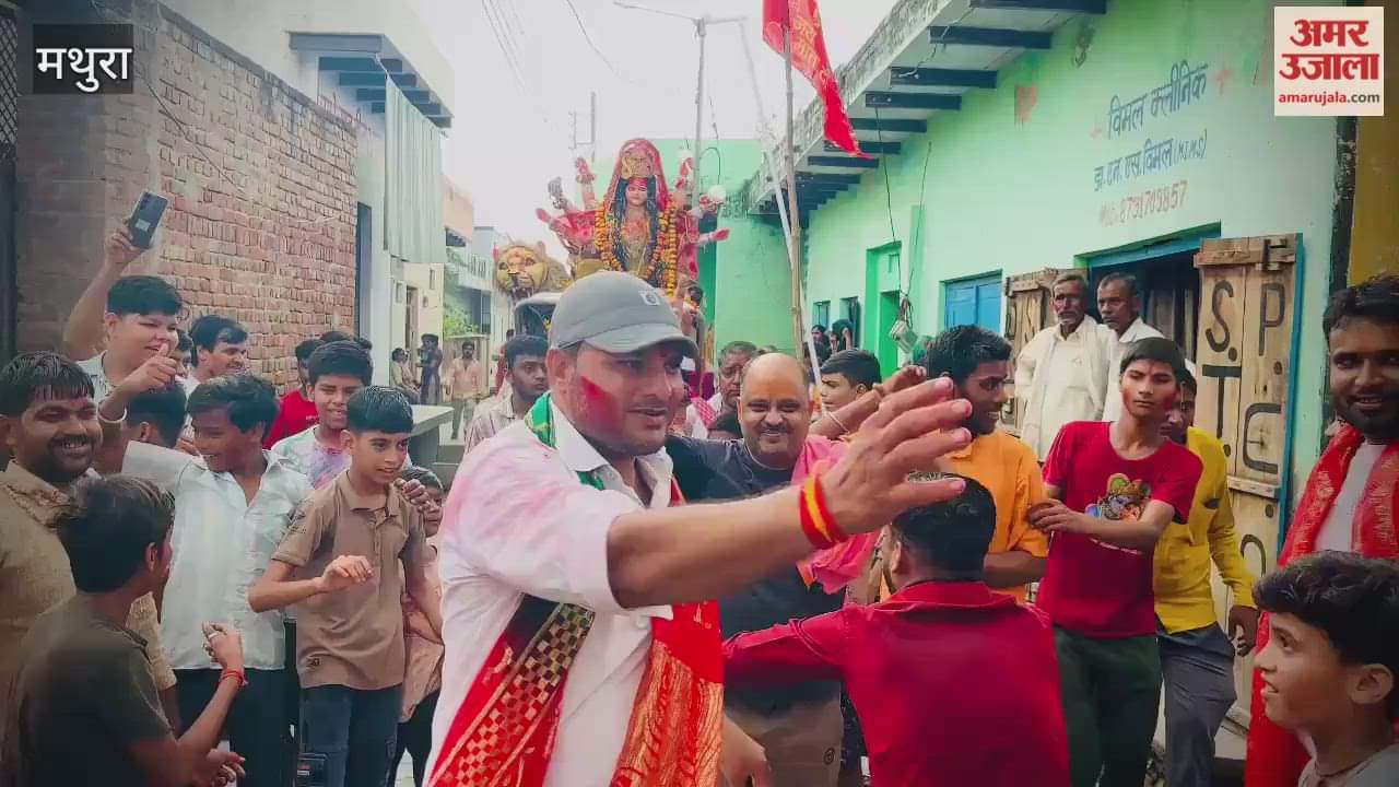Durga idol immersed with drums and trumpets