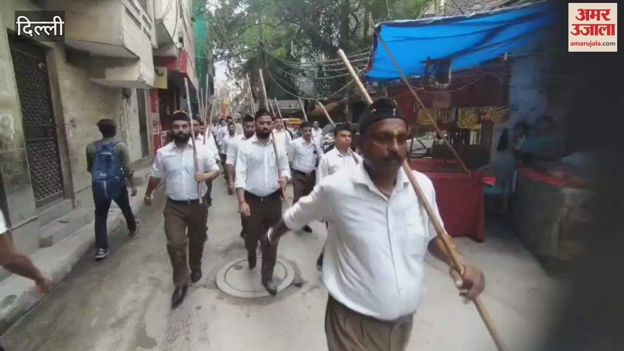 Rashtriya Swayamsevak Sangh volunteers taking out a parade in Patel Nagar area