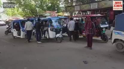 Auto drivers and cart pullers occupy the highway