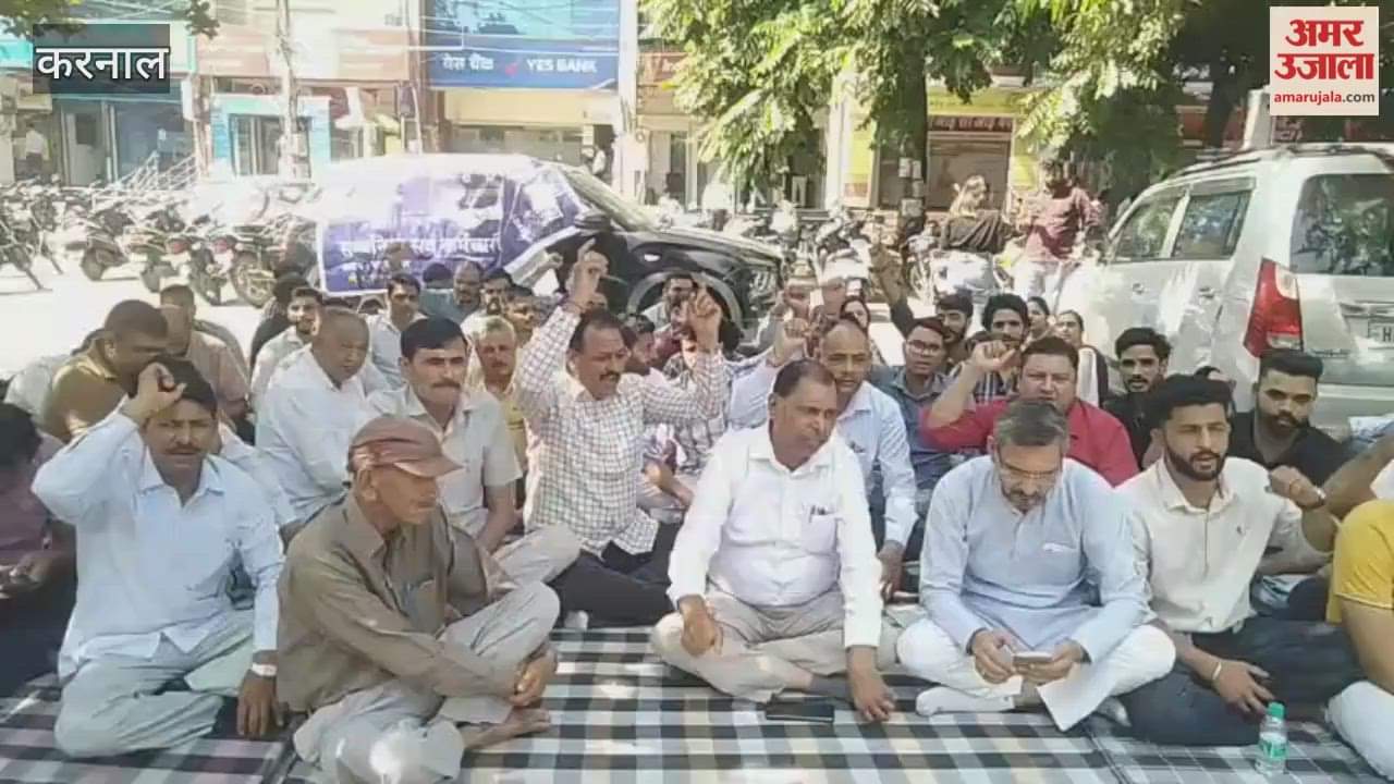 New Patwaris stage protest outside Mini Secretariat in Karnal over non-payment of salaries, raising slogans against the government.