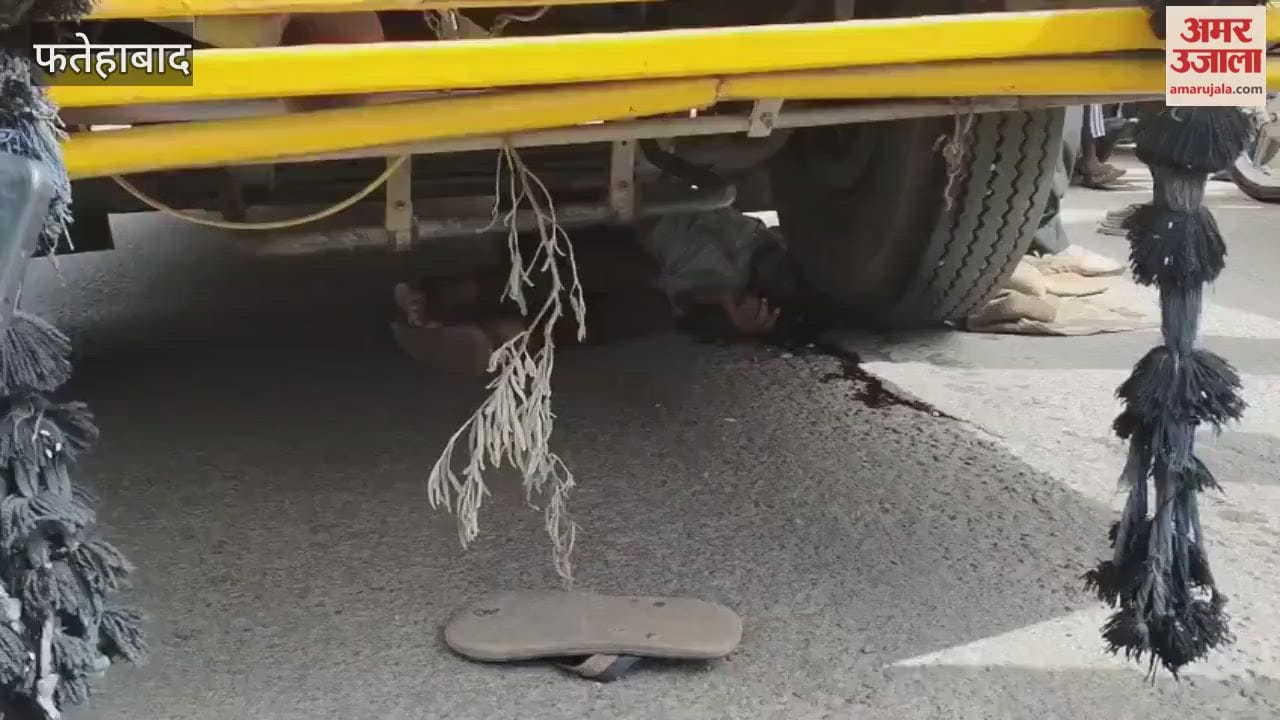 A man died after being hit by a school bus in Fatehabad; his body remained trapped under the tyre for 20 minutes.