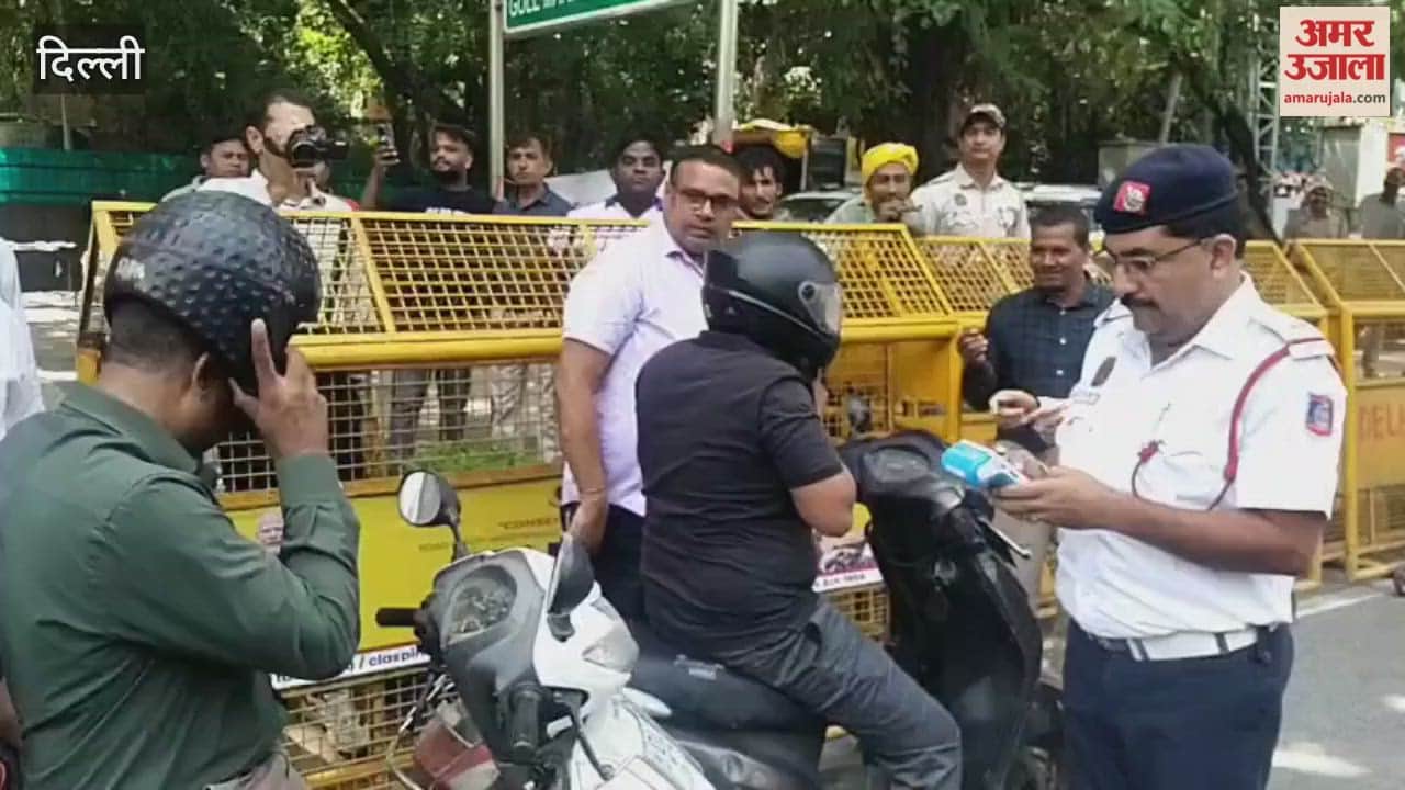 delhi traffic police conducts helmet check campaign at gol dak khana circle