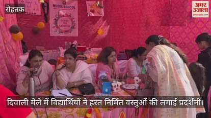 Students exhibit handmade items at the Diwali fair