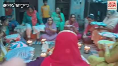 Married women in Jhajjar heard the story of Karva Chauth fast.