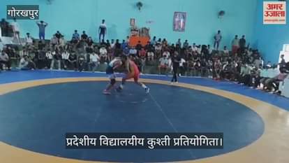 Wrestlers put their strength to the test, showcasing their skills in freestyle wrestling.