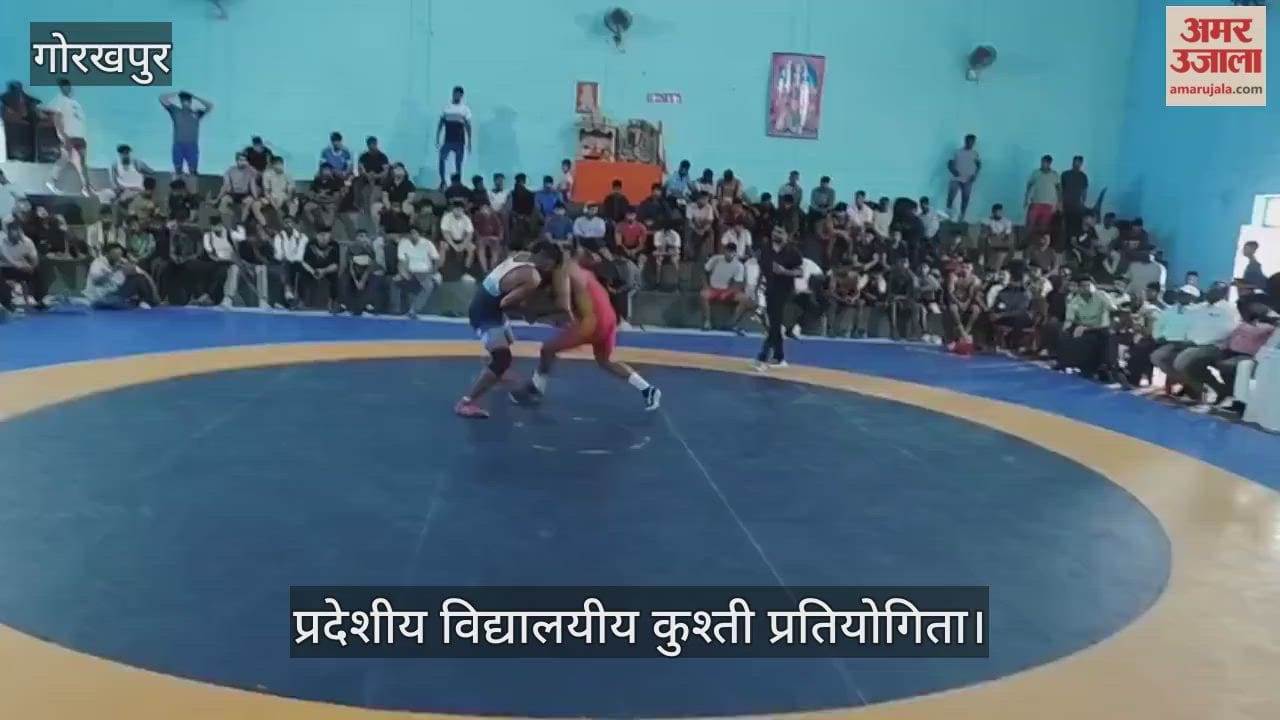 Wrestlers put their strength to the test, showcasing their skills in freestyle wrestling.