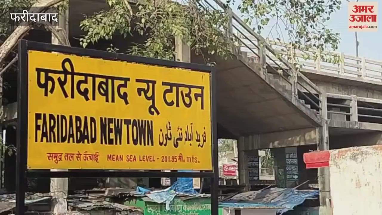 People fearlessly crossing the railway tracks at New Town Railway Station in Faridabad