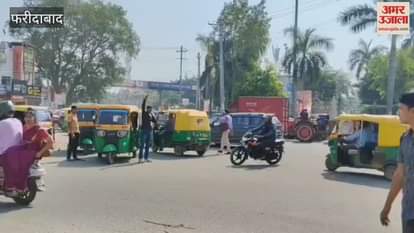 Automobiles parked at Neelam Chowk roundabout in Faridabad city have affected traffic