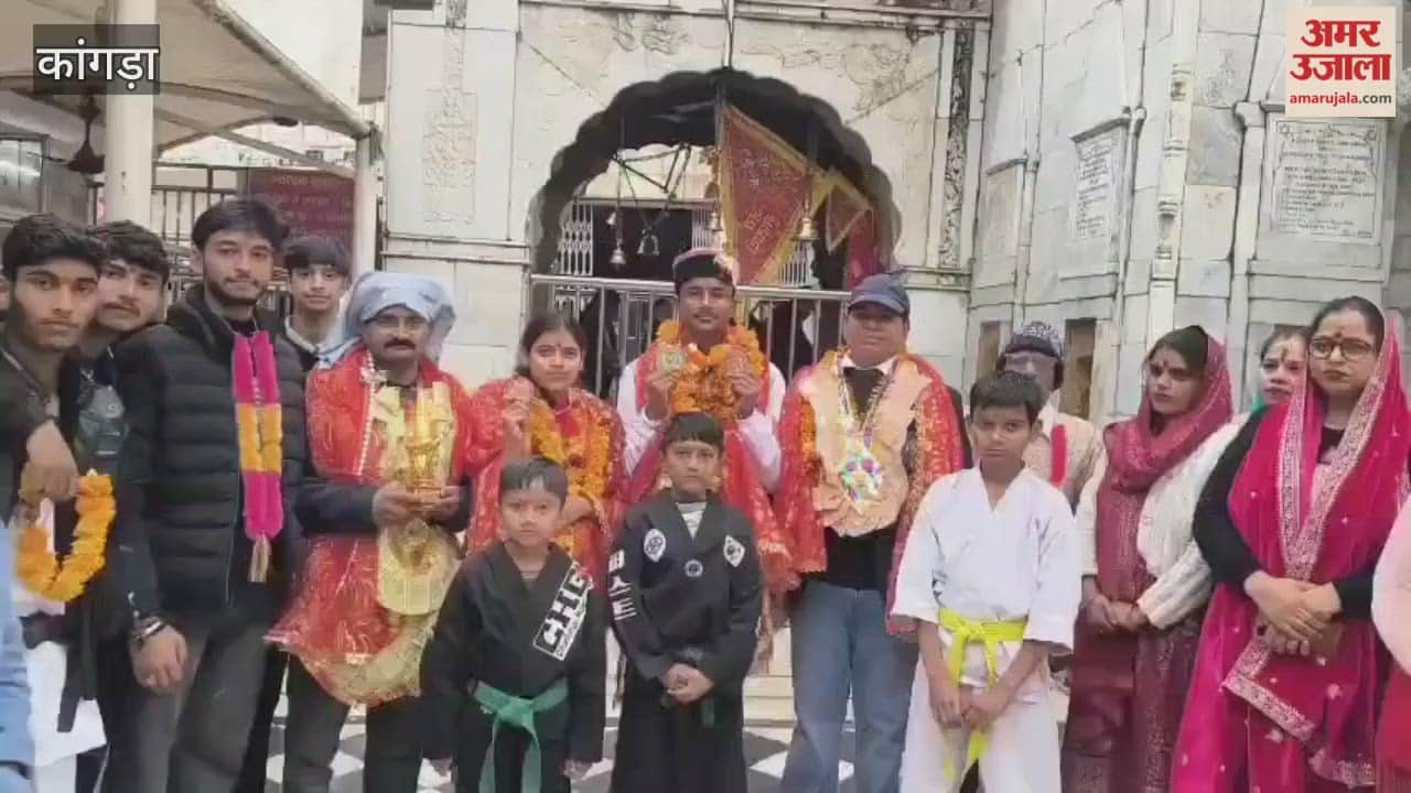 Kangra Karate players return to Jawalamukhi after winning national medals visit Mata Jwala temple with their coach