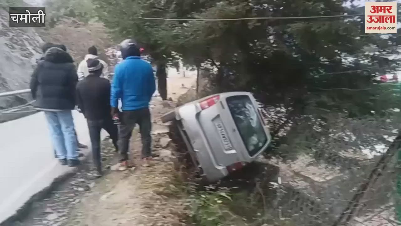 VIDEO: A tourist car overturned off the road near Chaudari on the Auli motor road.