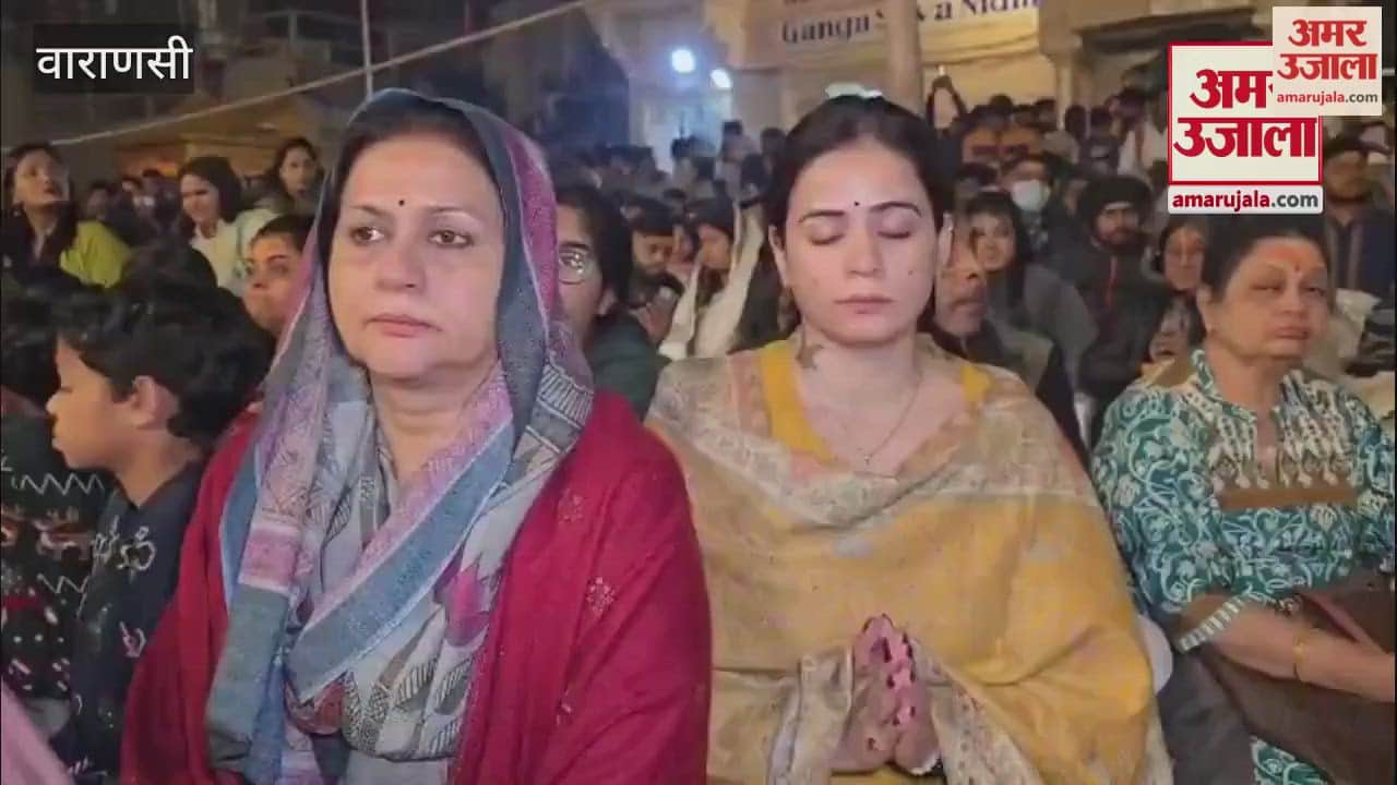 huge crowd of devotees gathered for Ganga Aarti in Varanasi for New Year
