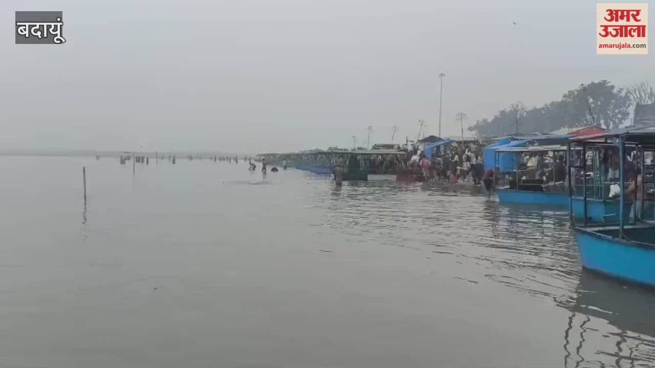 thousands of devotees took a holy dip in the Ganges River at the ghat in Badaun
