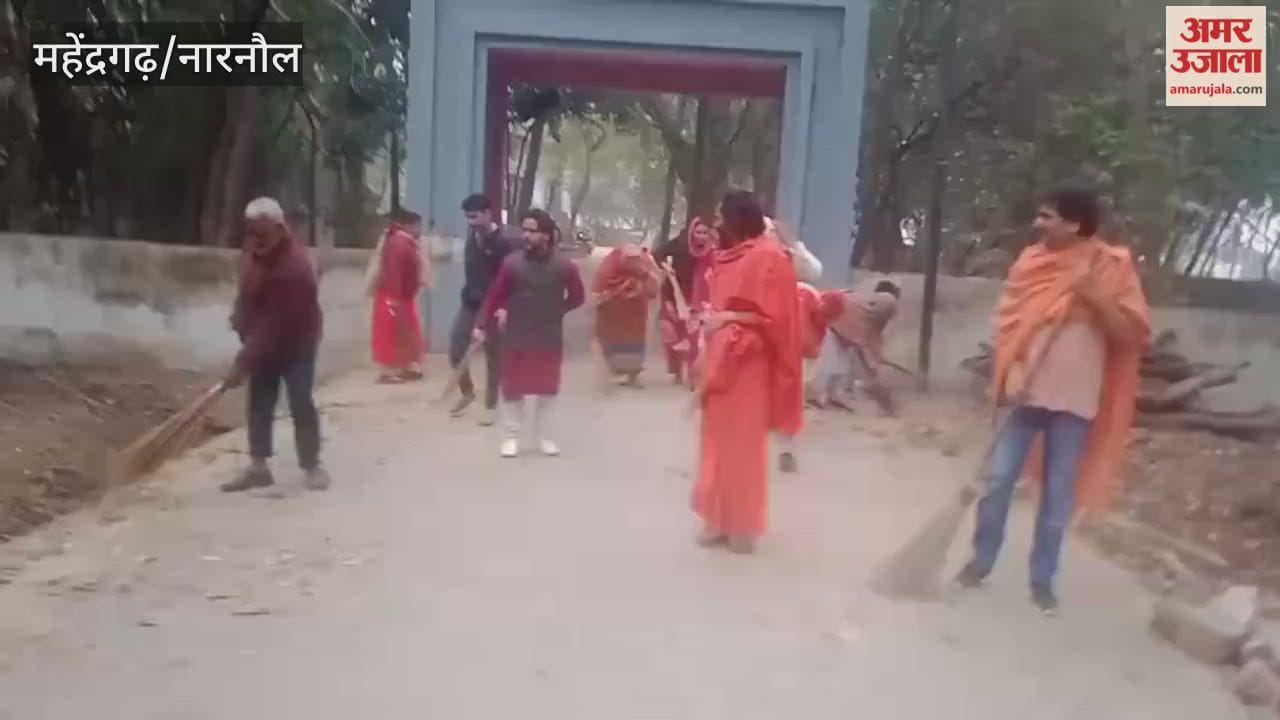 Devotees cleaned and tended to trees at Brahmachari Krishnanand Dham in Mahendragarh