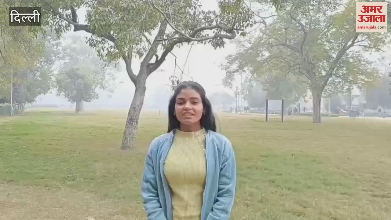 crowd of people gathered at India Gate on New Year