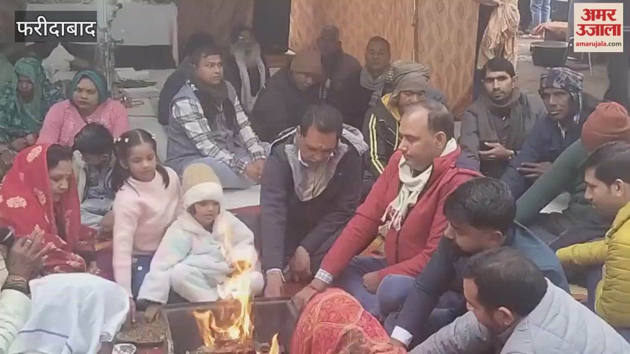 Railway employees performing a 'havan' at Old Faridabad railway station to welcome new year