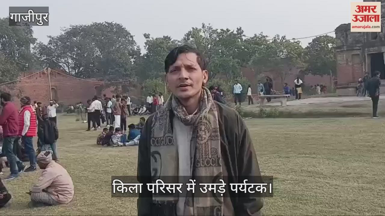 crowd of tourists gathered at historic fort complex in Hetampur on New Year 2026