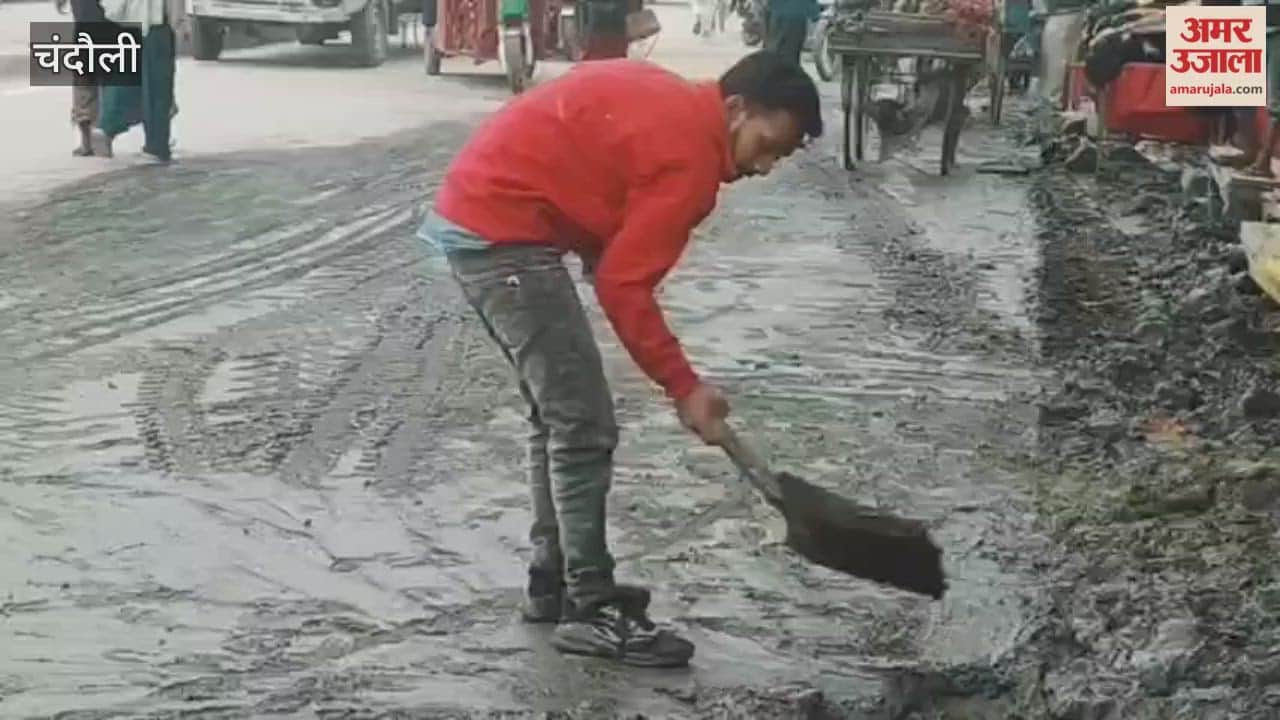 After cleaning drain debris was spread onto road shopkeepers had to clear it themselves