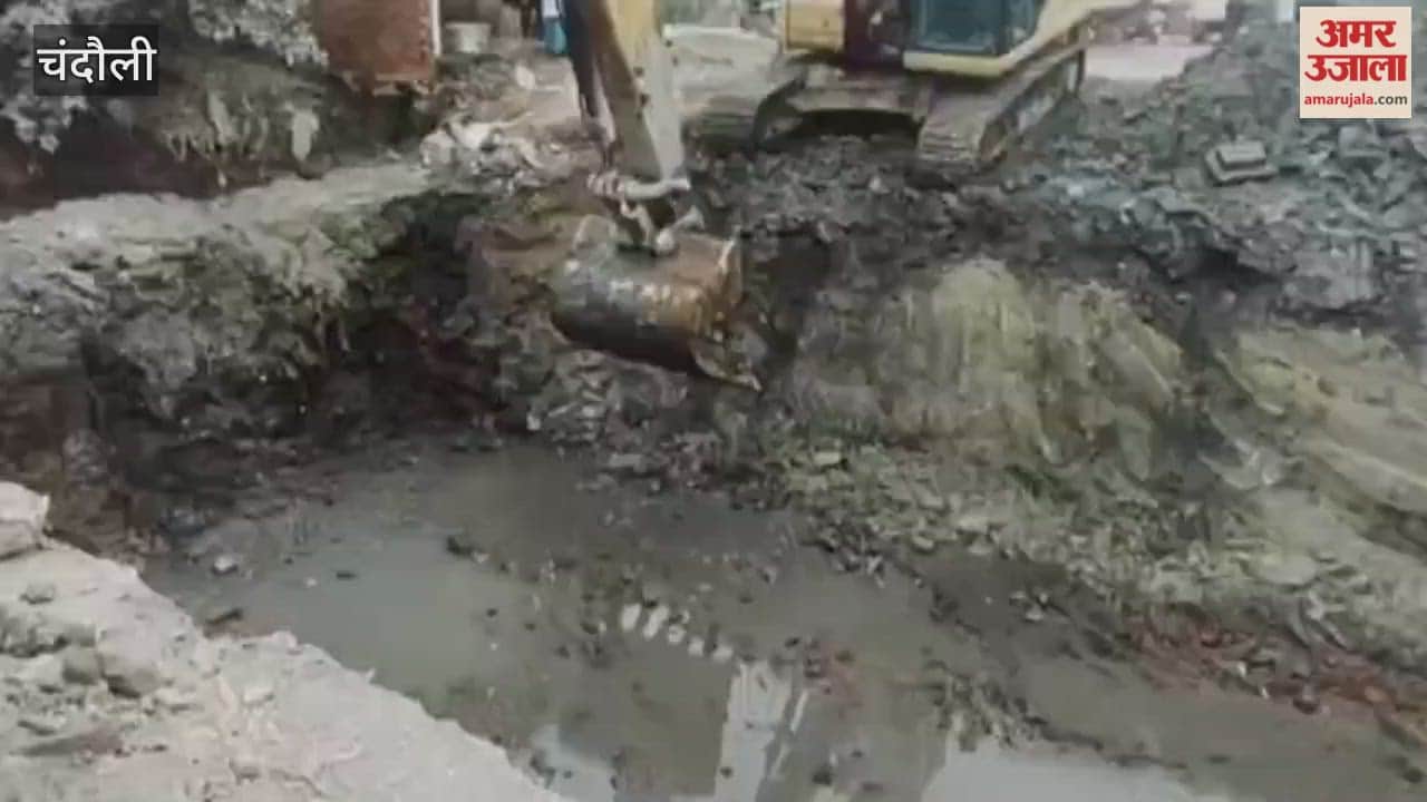 large pit has been dug at vegetable market intersection causing problems for pedestrians