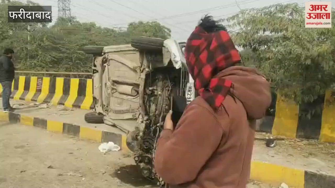 A car overturned after hitting a divider near Budhena in Greater Faridabad